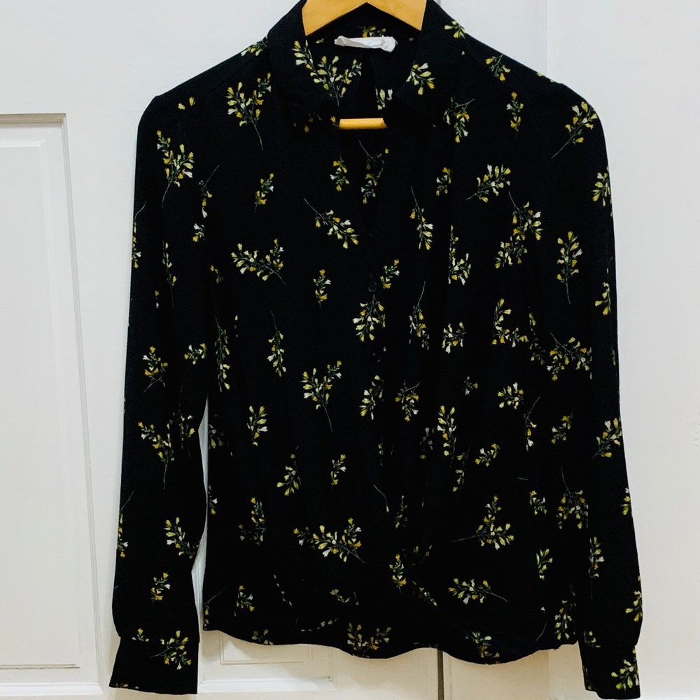All In Favor black blouse with flower bouquets